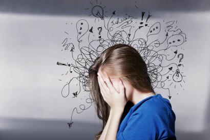 Woman appearing stressed