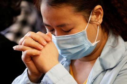 Health Care Worker Praying